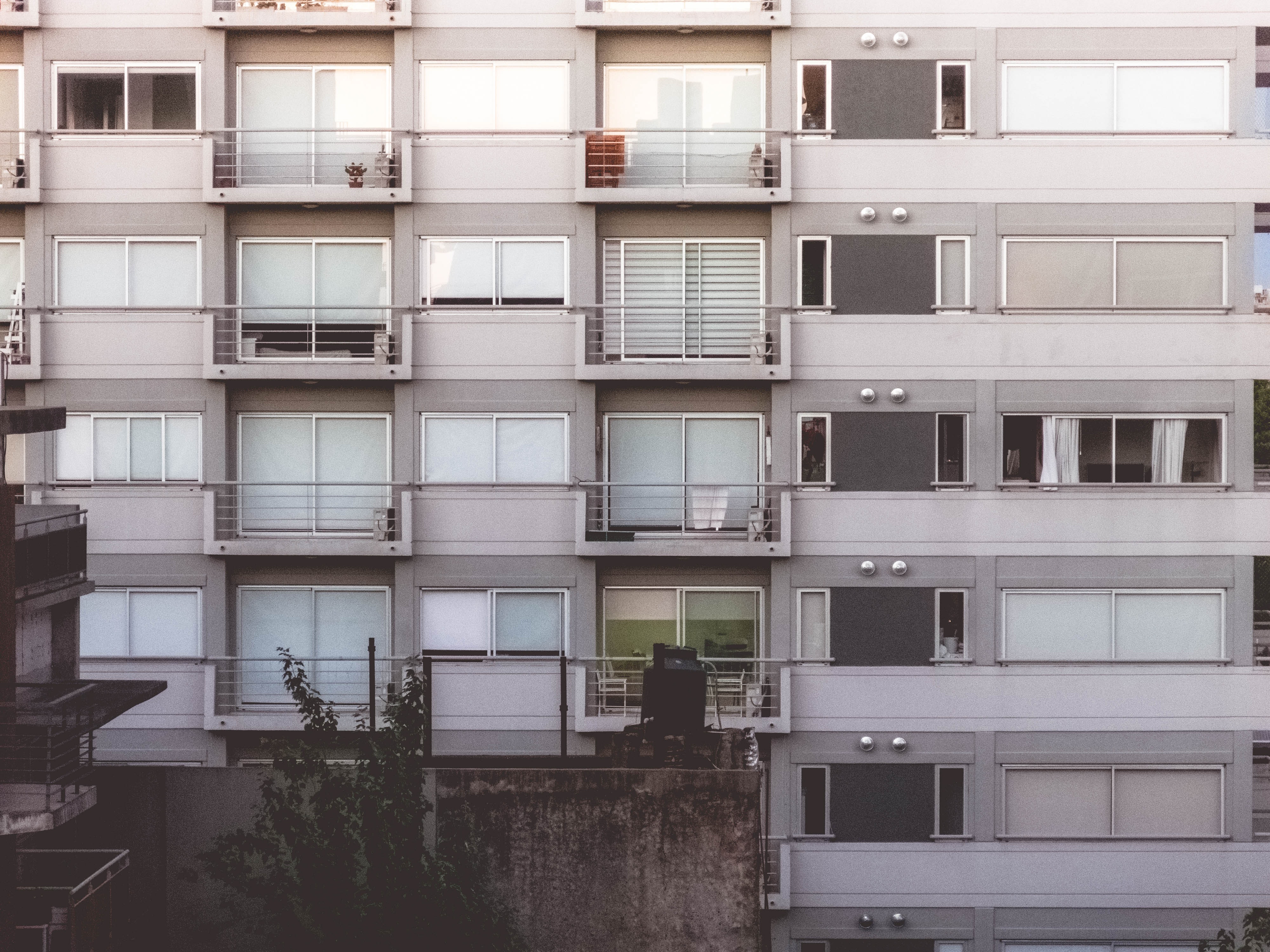 balconies of beige apartment building