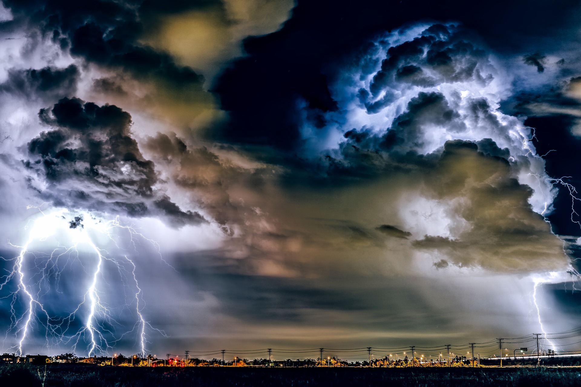 dark storm clouds rolling in with lightning