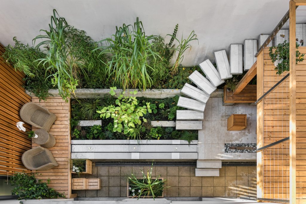 looking down on courtyard from deck or porch