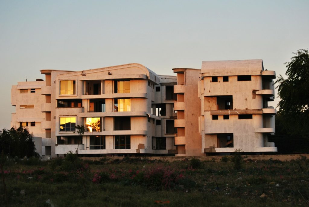 run down condominium building in need of repairs