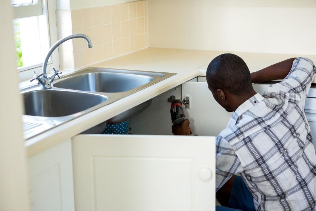 fixing a kitchen leak