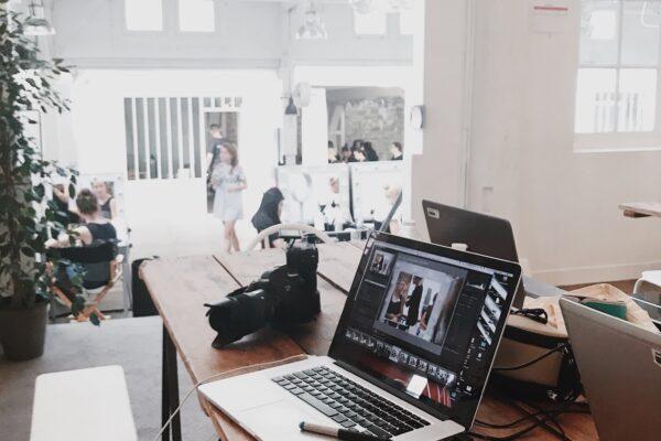 Workstation with laptop and camera.